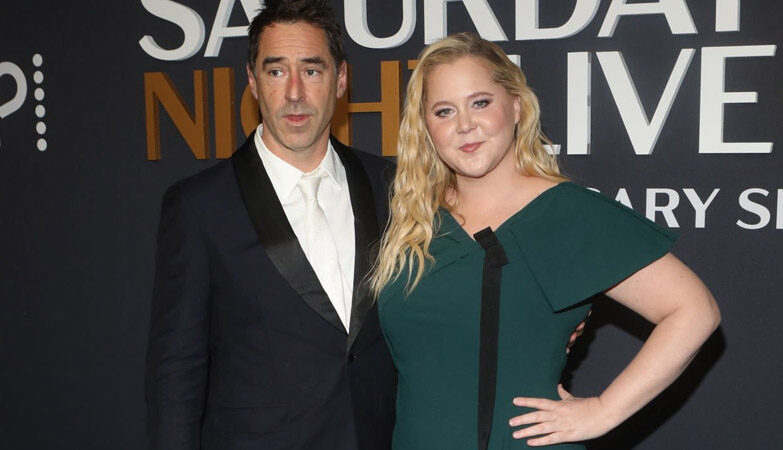 Amy Schumer and Chris Fischer